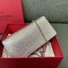 Valentino Garavani VLogoSignature grained calfskin clutch